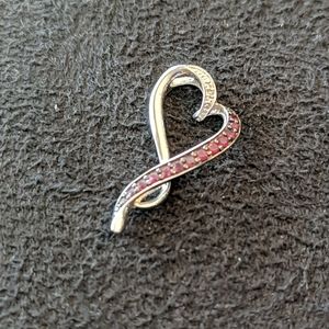 Sterling silver ruby and diamond heart pendant